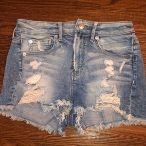 High waisted distressed jean shorts